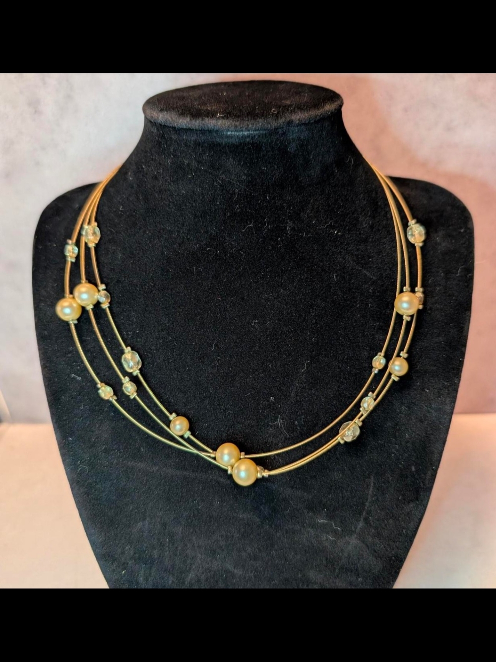 Lia Sophia.Style: Multi-strand "illusion" choker necklace.